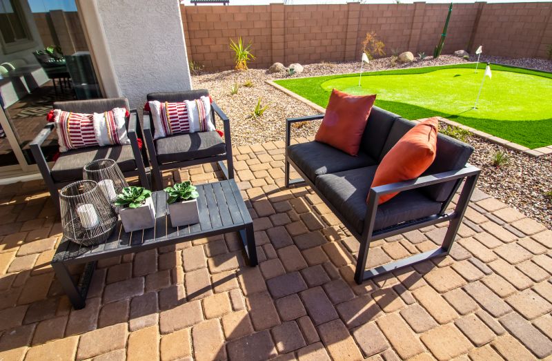 Outdoor living area with paver flooring